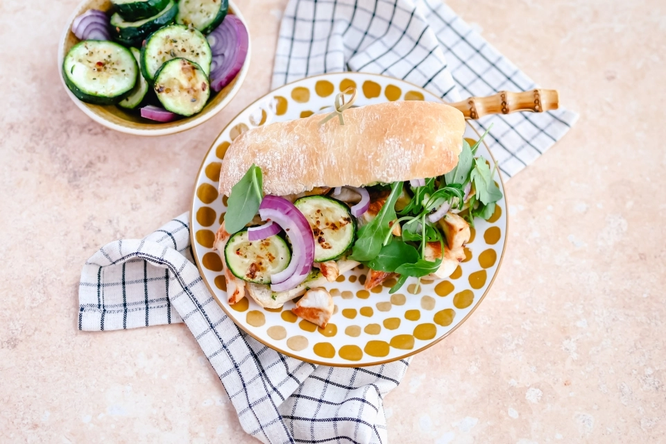 Ciabatta with chicken, pesto, zucchini & red onion