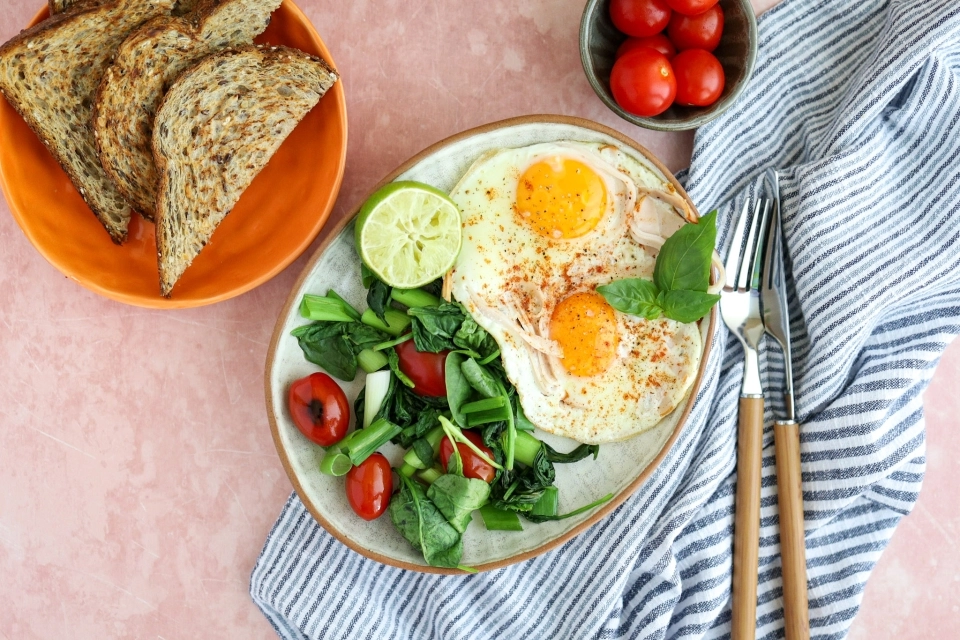 Sunny-side up egg with turkey strips