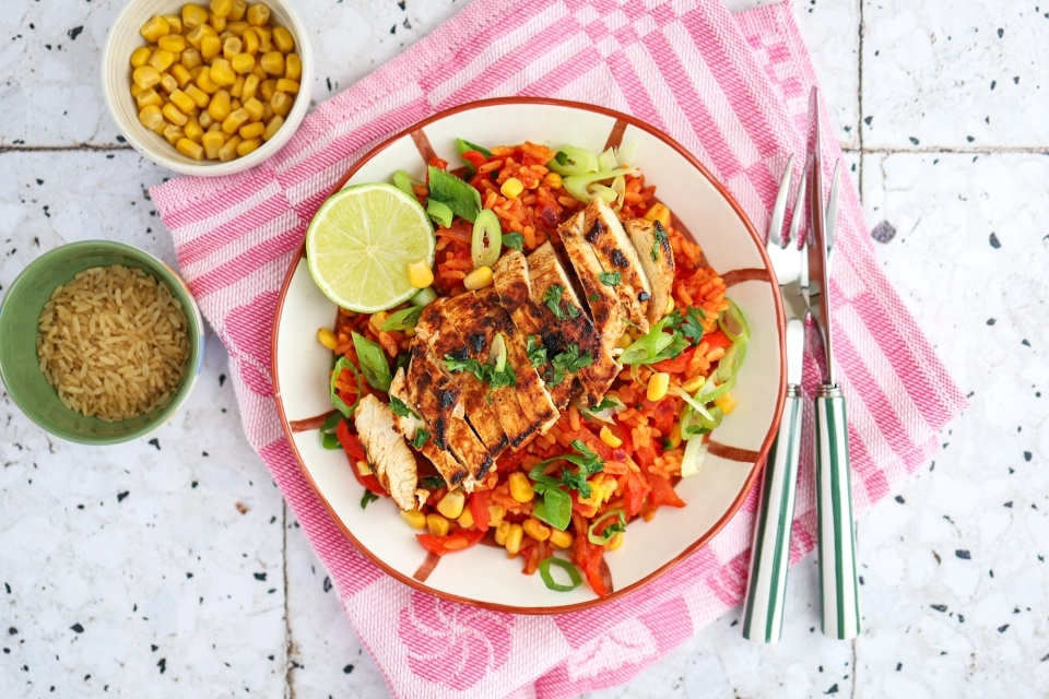 Mexican rice with grilled chicken, bell pepper & corn