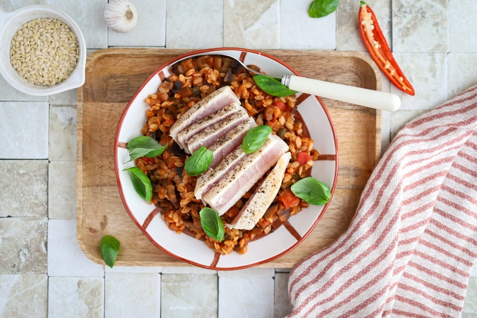 Tomato-eggplant orzo with tuna