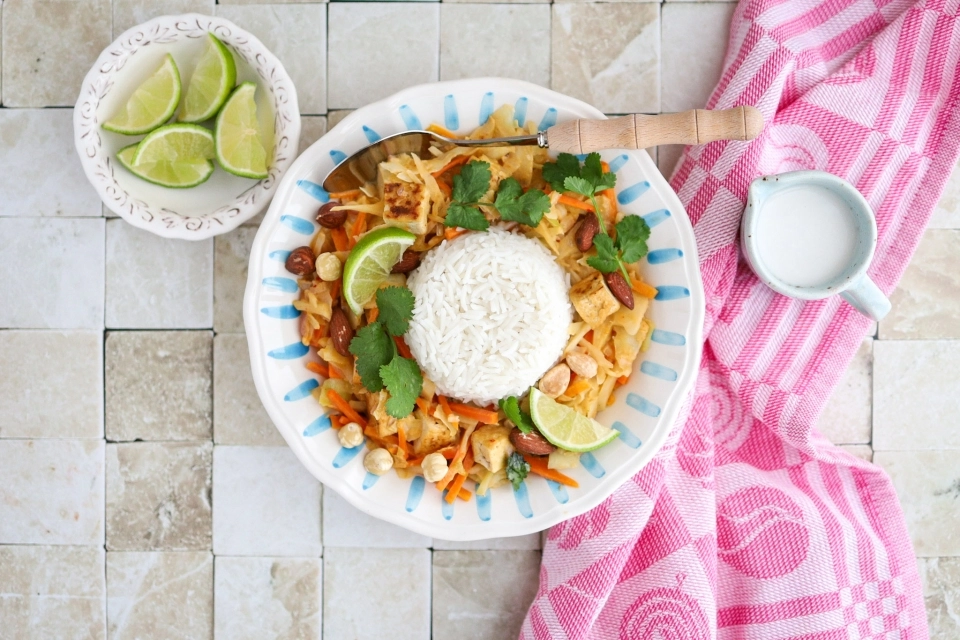 Coconut rice bowl with tofu, cabbage & crunchy nuts